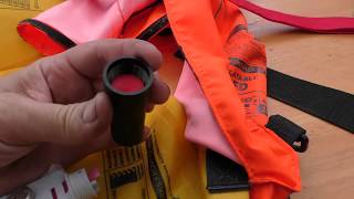 Servicing and rearming an inflatable PFD lifejacket [upl. by Terrena328]