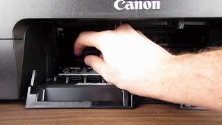 Canon PIXMA TS3150 Change ink cartridges [upl. by Aihsetal]