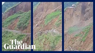 Massive landslide sweeps away portion of road in India [upl. by Norre307]