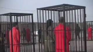 ISIS releases video of Peshmerga fighters in cages [upl. by Redyr434]